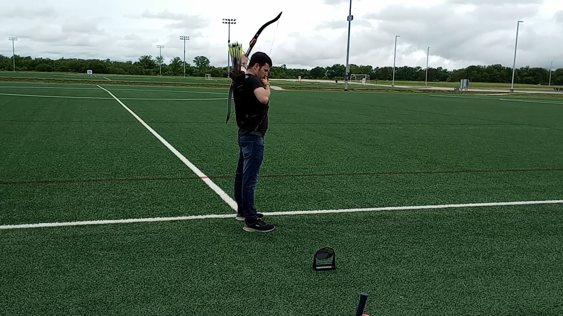 Casey Wilhelm's record for farthest target hit while looking in a mirror