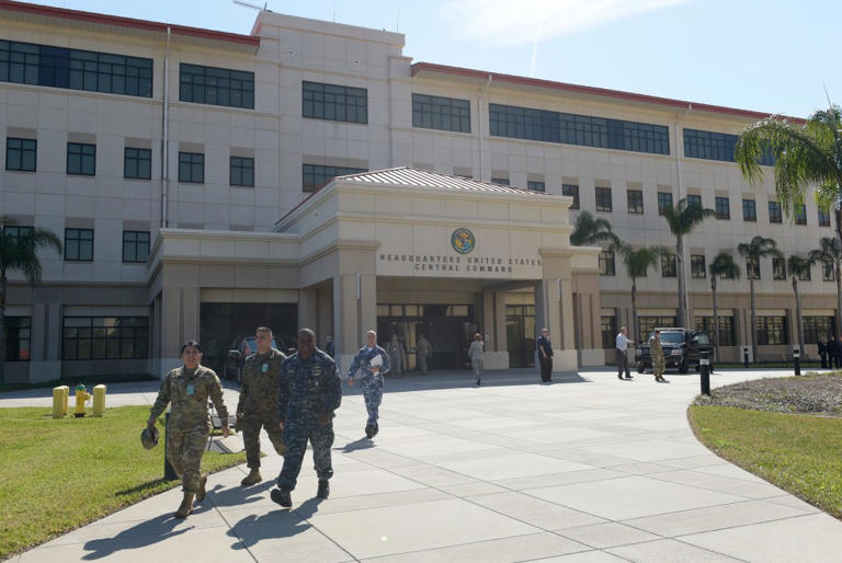 Siblings charged after IED found at MacDill, brother flees to China: Feds