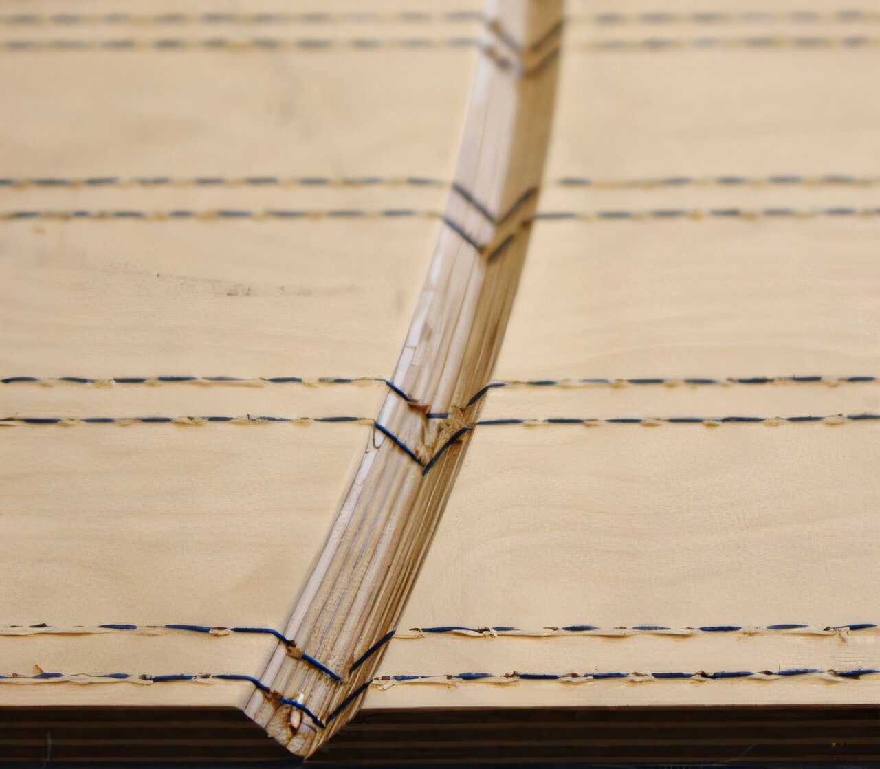 Strengthening wood with needle and thread