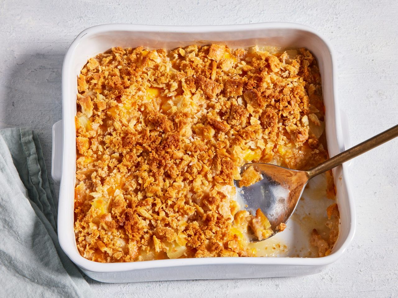 Pineapple Casserole in a square casserole pan