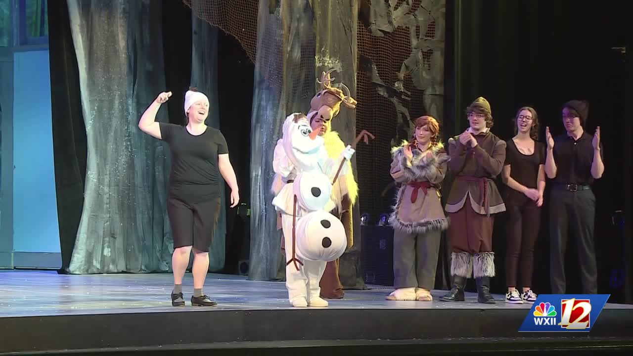 American Sign Language shadow interpreters make history in Reynolds ...