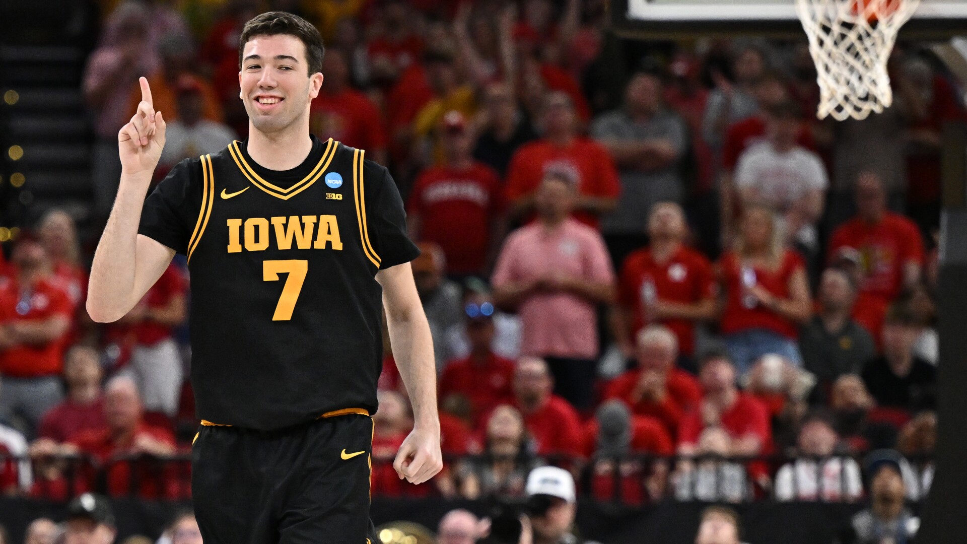 Ninth-seeded Iowa continues improbable March run, beating Nebraska 77 ...