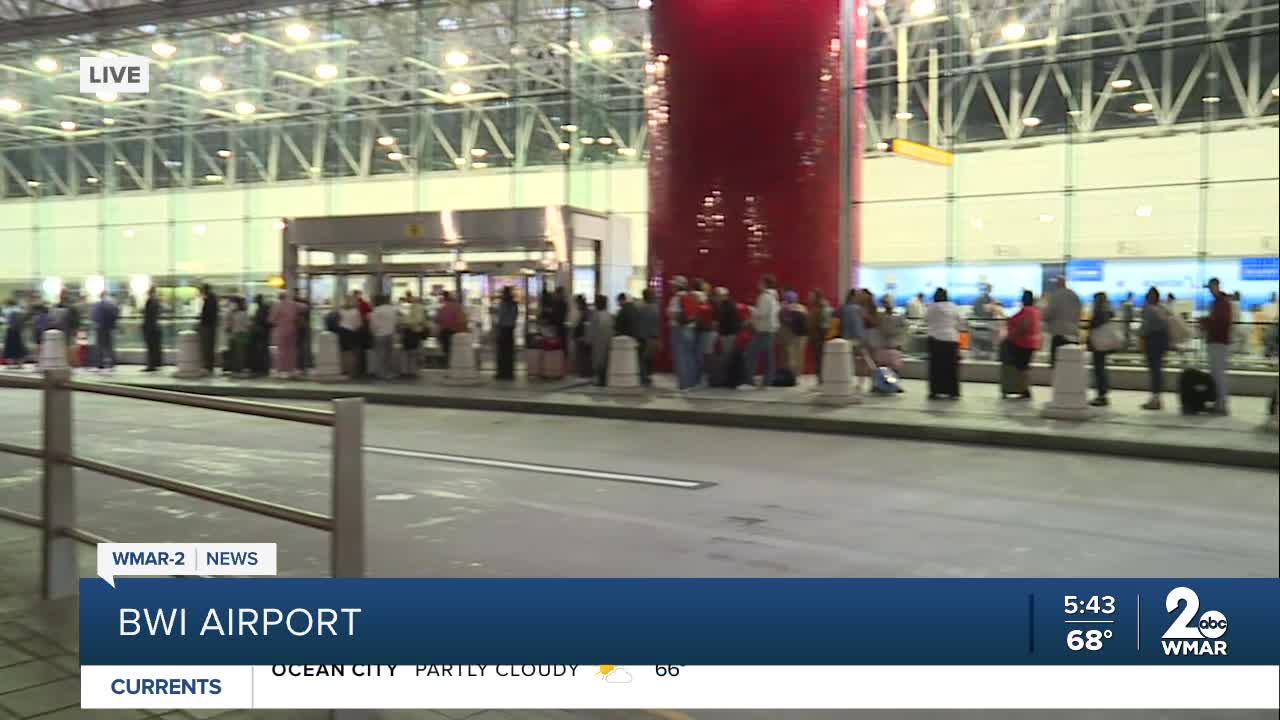 TSA security lines stretch out the door at BWI airport on Friday March 27