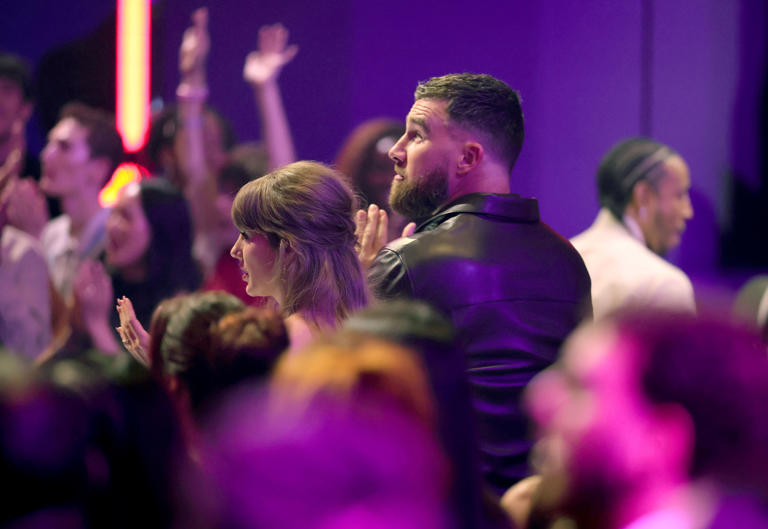 Taylor Swift thanks Travis Kelce as couple make awards show debut