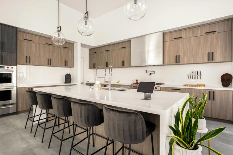 View of Forest-inspired surfaces add tactile depth to minimalist custom home