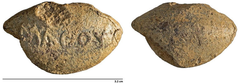Why was this 2,000-year-old sling bullet inscribed with the word 'learn'?