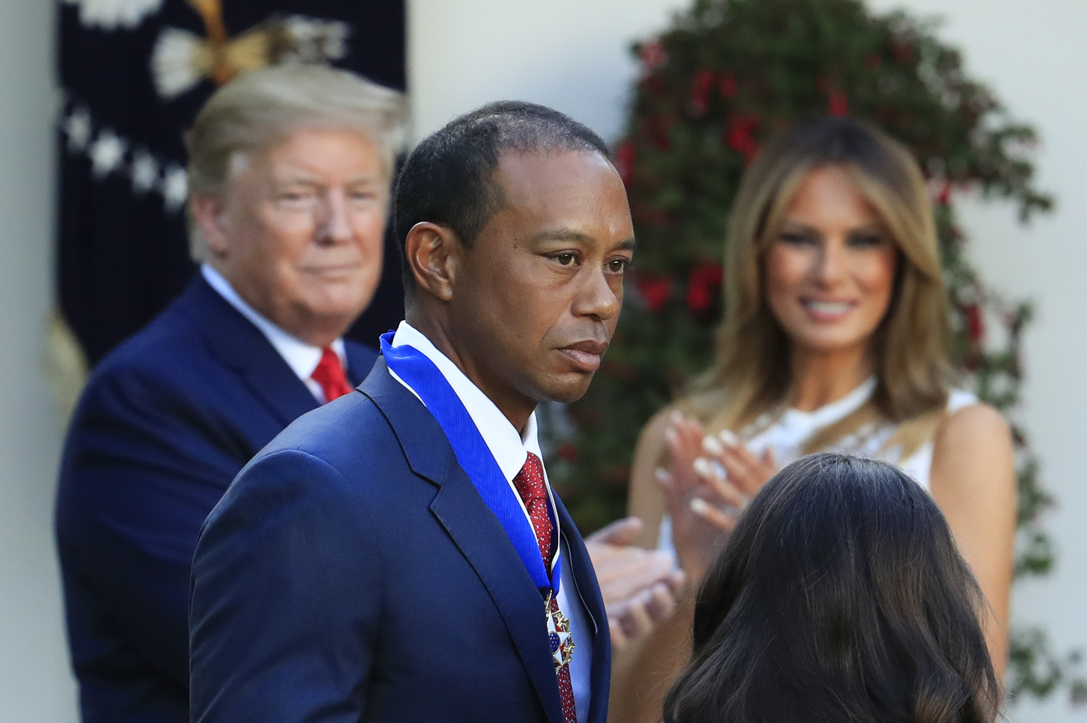 Donald Trump reacts to Tiger Woods