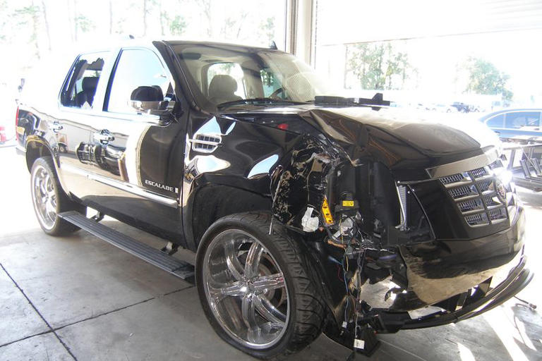 Tiger Woods in horror rollover crash as Range Rover pictured on its ...