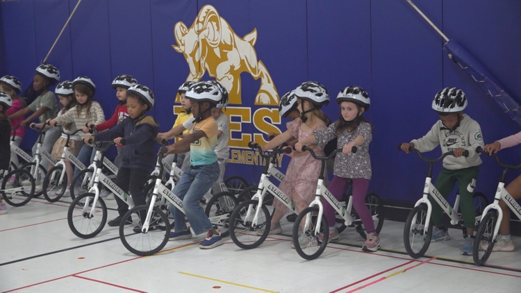 Kindergartners at Heritage Elementary learn to bike with new PE program