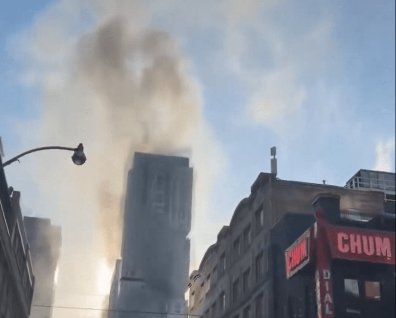 Explosions from Toronto building rooftop fire shut down streets downtown