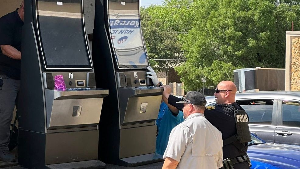 Police seize 50 slot machines, shut down illegal gambling site on ...