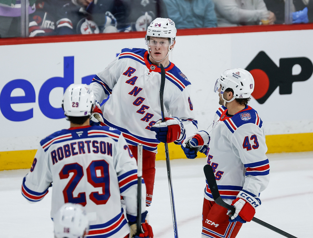 Garand stops 27 for first NHL win as Rangers down Blackhawks 6-1