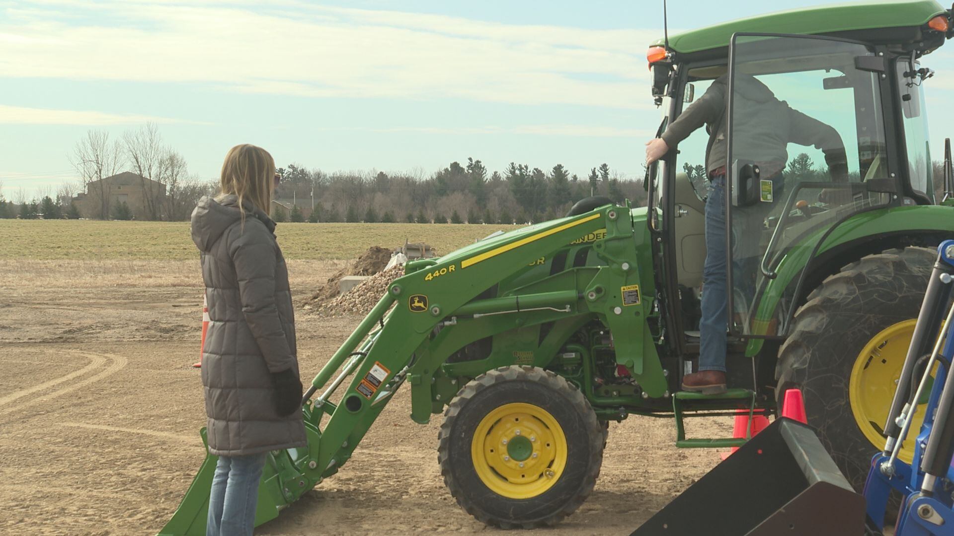 Students learning farm and tractor safety during spring break