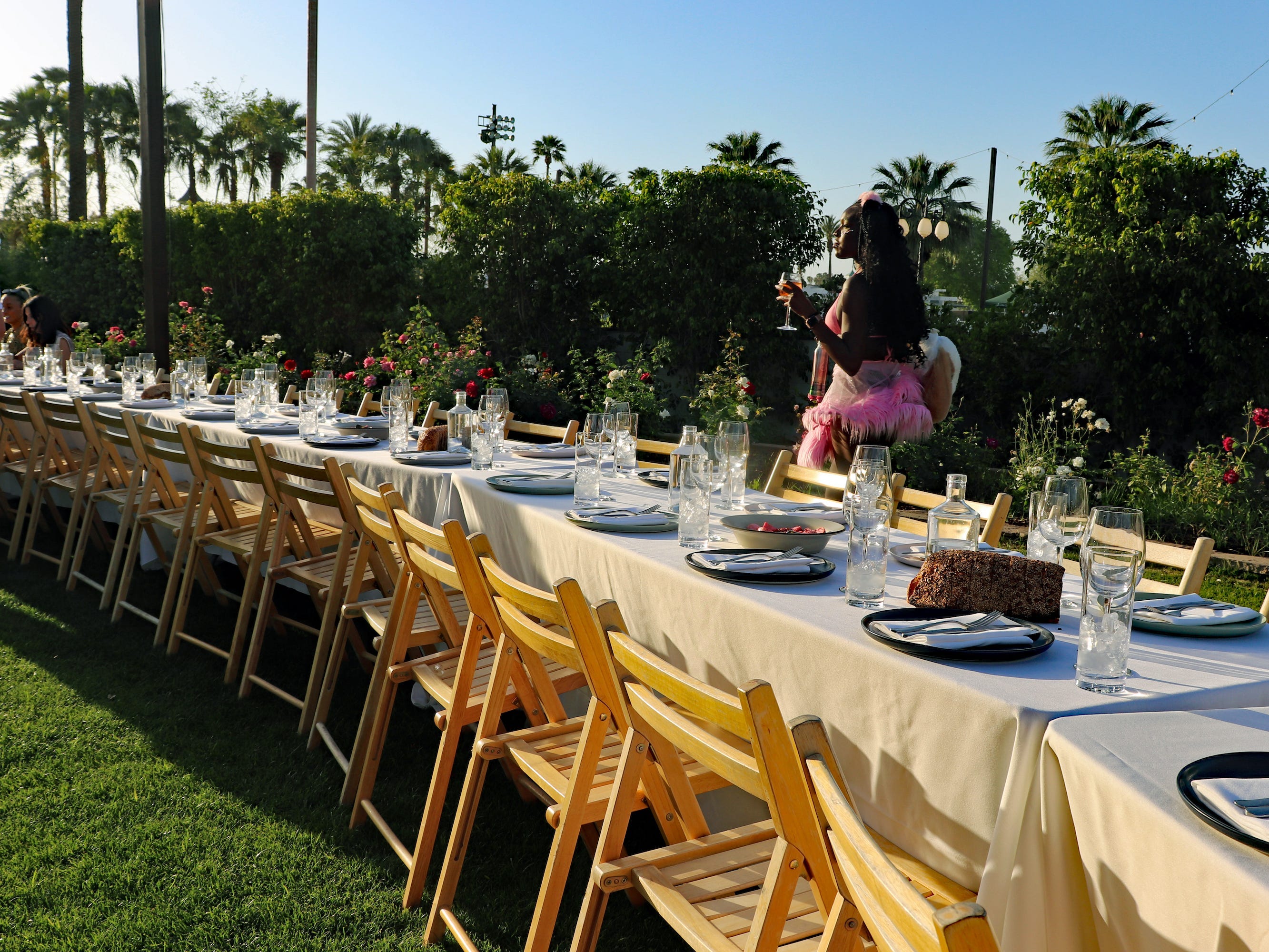 <p>Outstanding in the Field, billed as "a roving restaurant without walls," has hosted <a href="https://outstandinginthefield.com/coachella/" rel="noopener">the pop-up dining experience at Coachella</a> for the past eight years.</p>