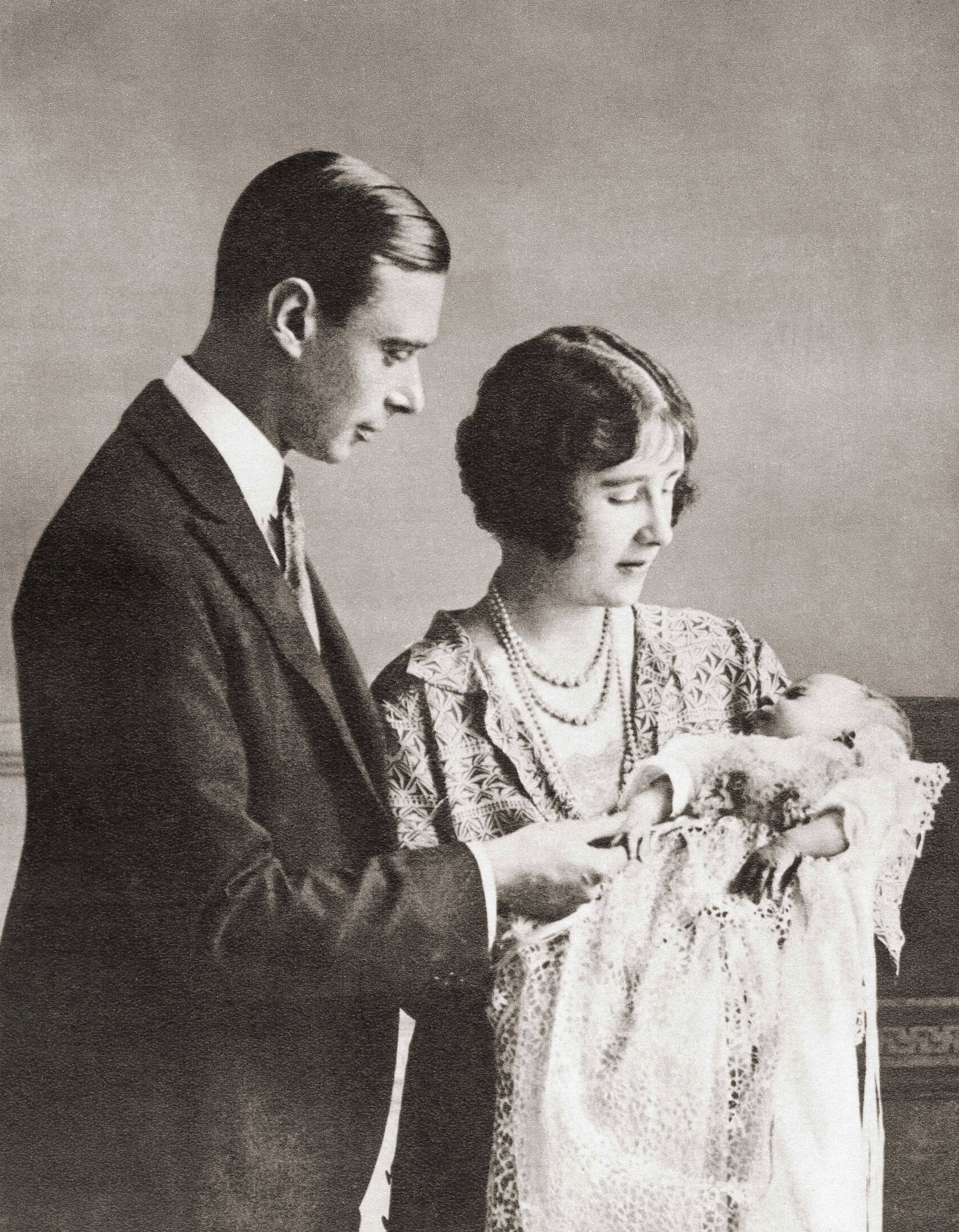 <p>Prince Albert, Duke of York (later King George VI) and wife Elizabeth, Duchess of York (later Queen Elizabeth, then Elizabeth the Queen Mother) posed for a portrait with baby daughter Princess Elizabeth -- the future Queen Elizabeth II -- at her christening in 1926. </p><p>MORE: <a href="https://www.wonderwall.com/celebrity/photos/royal-christening-baptism-photos-britain-sweden-greece-spain-monaco-norway-denmark-netherlands-royal-families-historical-3015197.gallery">The best photos from royal christenings through the decades</a></p>