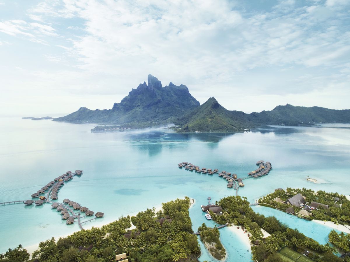 <p>Few things rival the romanticism of an overwater bungalow, and those found in Bora Bora offer the privacy and dazzling views many are looking for in an amorous escape. The secluded white-sand beaches, sparkling turquoise water, and large selection of luxury hotels combine to award Bora Bora the moniker, “The Romantic Island.”</p>