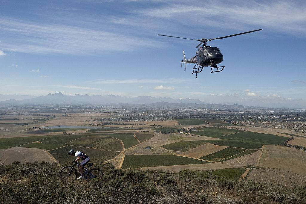 <p>One of the most popular helicopter tour options in Cape Town, South Africa is the "Two Oceans" flight where riders can fly over both the Atlantic and Indian Oceans. You'll also get to fly behind Table Mountain and the Twelve Apostles mountain range, which are some of the greatest natural wonders in Africa.</p> <p>If you get a chance to ride above Muizenberg Beach, you might be able to see some great white sharks. Once you finish with the helicopter tours there are plenty of other ways to see Cape Town including safaris, gourmet picnics, and shark cage diving.</p>