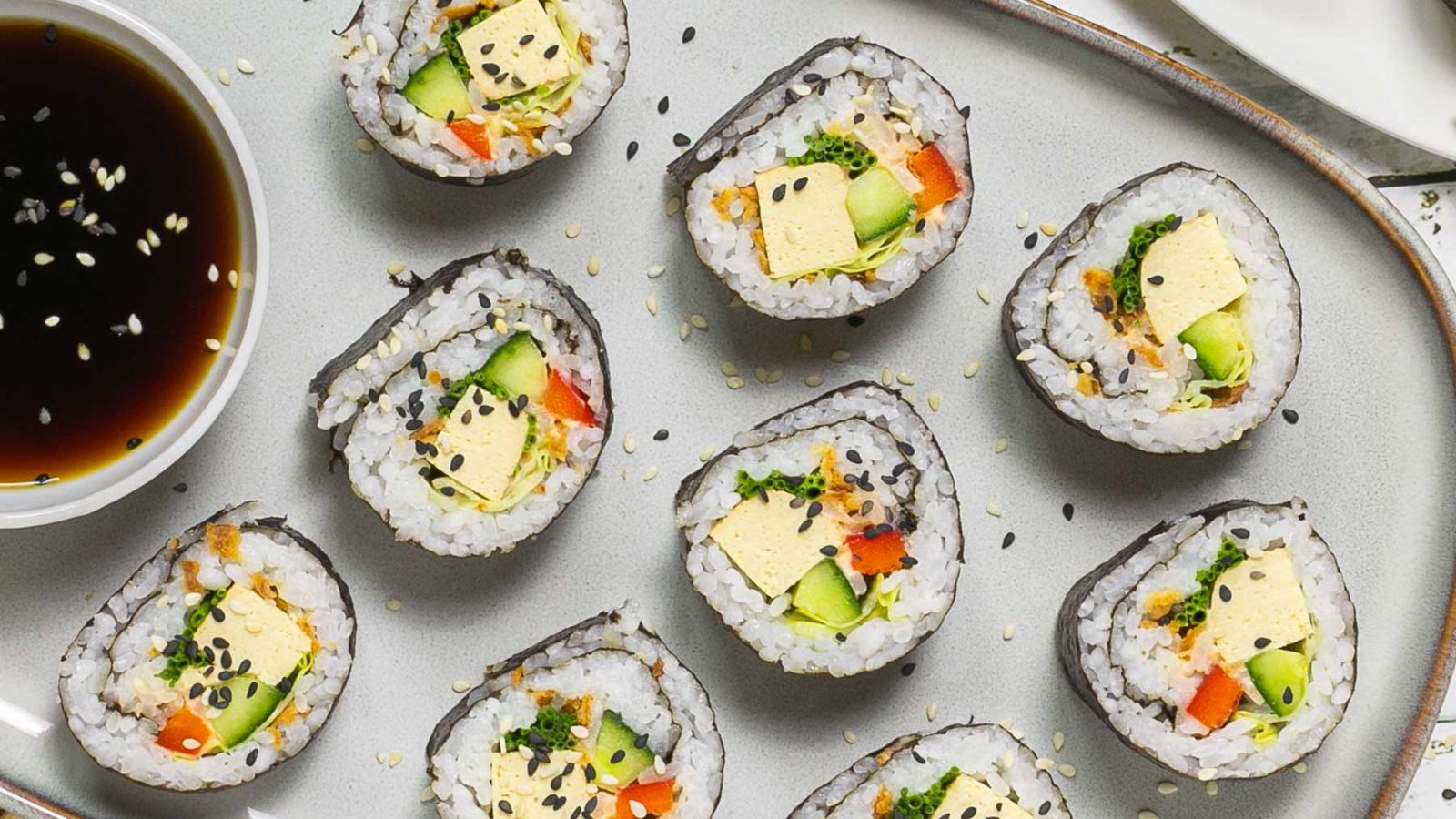 <p>This tofu sushi recipe combines smoked tofu, veggies, and a sriracha mayo to make delicious maki sushi rolls the entire family will love. You do not need to be a professional sushi chef to whip up this recipe.</p> <p><strong>Recipe: <a href="https://mypureplants.com/tofu-sushi-rolls/">tofu sushi rolls</a></strong></p>