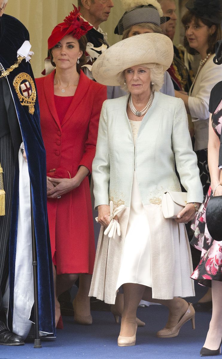 <p>Kate and Camilla perform a curtsy after the Order of The Garter Service at St George's Chapel.</p>