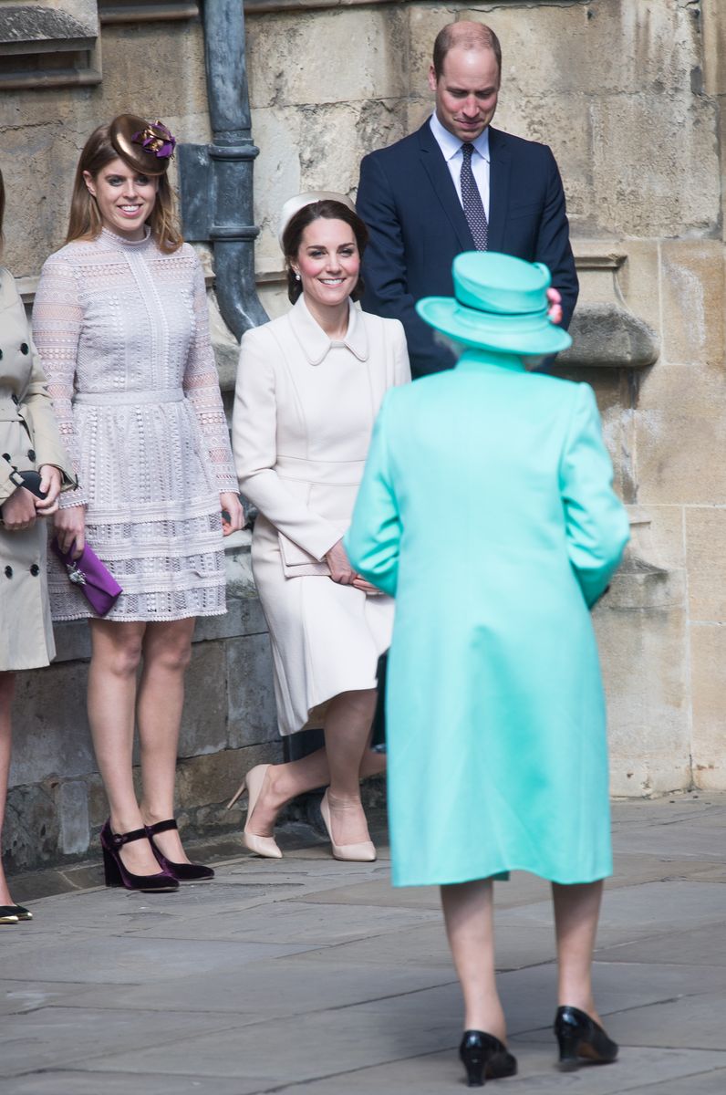 <p>Kate performs a deep curtsy as the queen arrives for the traditional Easter service at St George's Chapel.</p>