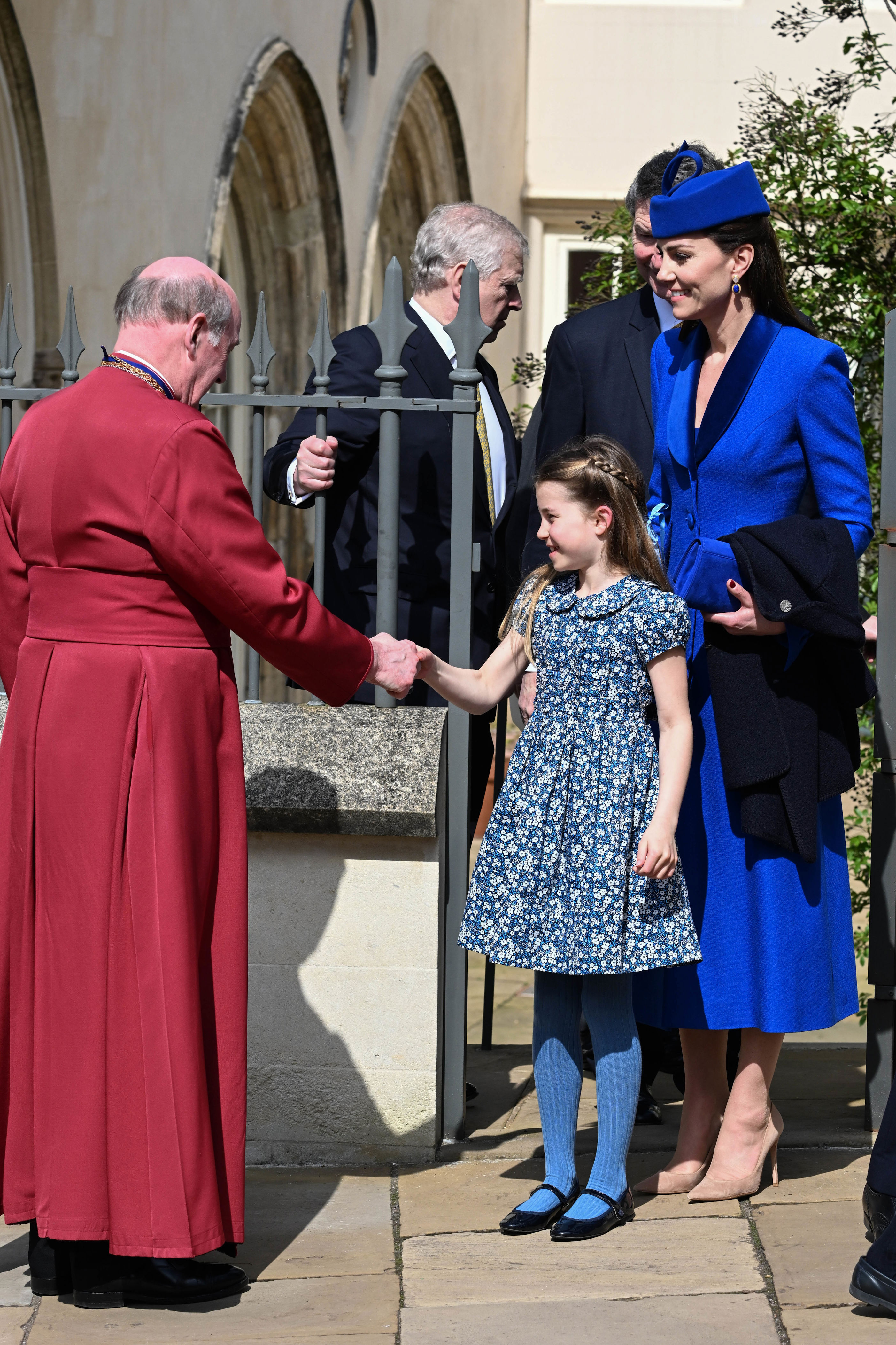 <p>Princess Charlotte shook hands with bishop David Conner as Princess Kate smiled following the Easter Mattins Service at St. George's Chapel at Windsor Castle in England on April 9, 2023.</p>