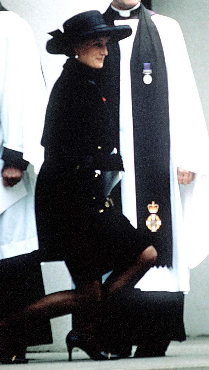 <p>Diana curtsies to Queen Elizabeth during the funeral of her father, John Spencer, 8th Earl Spencer.</p>