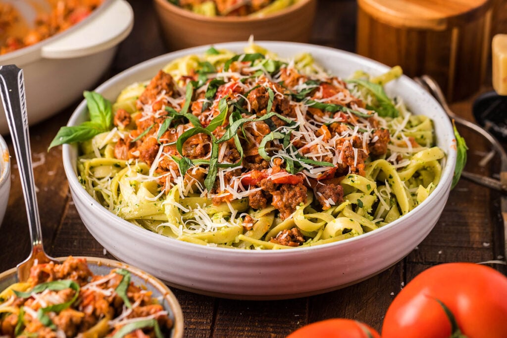 <p>Indulge in a delicious homemade Italian pasta dinner with pesto fettuccini and Bolognese sauce, bursting with fresh veggies in every bite. This hearty dish, featuring a homemade beef Bolognese meat sauce and fettuccine pasta, will satisfy your cravings for a flavorful Italian meal.<br><strong>Get the Recipe: </strong><a href="https://xoxobella.com/pesto-fettuccini-bolognese-sauce/?utm_source=msn&utm_medium=page&utm_campaign=msn" rel="noreferrer noopener follow"><strong>Pesto Fettuccini with Bolognese Sauce</strong></a></p>