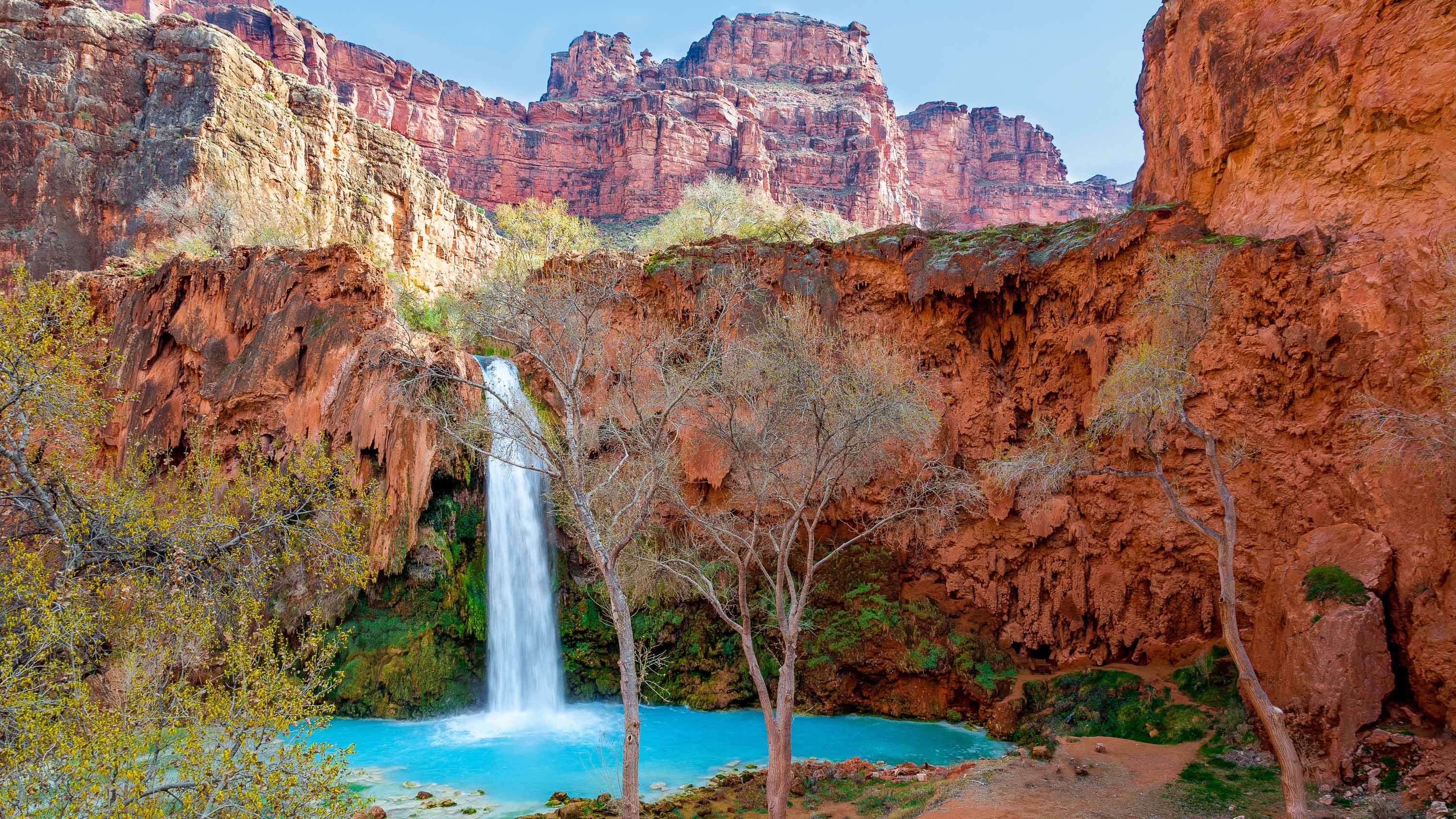 <p><strong>Estimated cost:</strong> $341</p> <p>Tucked in a side canyon at the bottom of the Grand Canyon, Supai Village is one of the quietest and most remote places in the lower 48 states, according to the USDA. Mail is still delivered by mule, and the village has little more than a cafe, lodge, store and museum.</p> <p>The main attractions are its remote places, which include tumbling blue-green waterfalls and pastel canyonlands. Swim in a sparkling natural pool beneath the 190-foot Mooney Falls, or have a picnic with 120-foot Havasu Falls as a backdrop. There's also a hike-in campground and trails leading to the Colorado River just 10 miles away.</p> <p><strong>How to get there:</strong> Fly to Las Vegas and rent a car for the 221-mile journey that will take you to Hoover Dam and along a stretch of Route 66. Spend the night at Peach Springs before tackling the last 64 miles of dirt road to Hualapai Hilltop.</p>