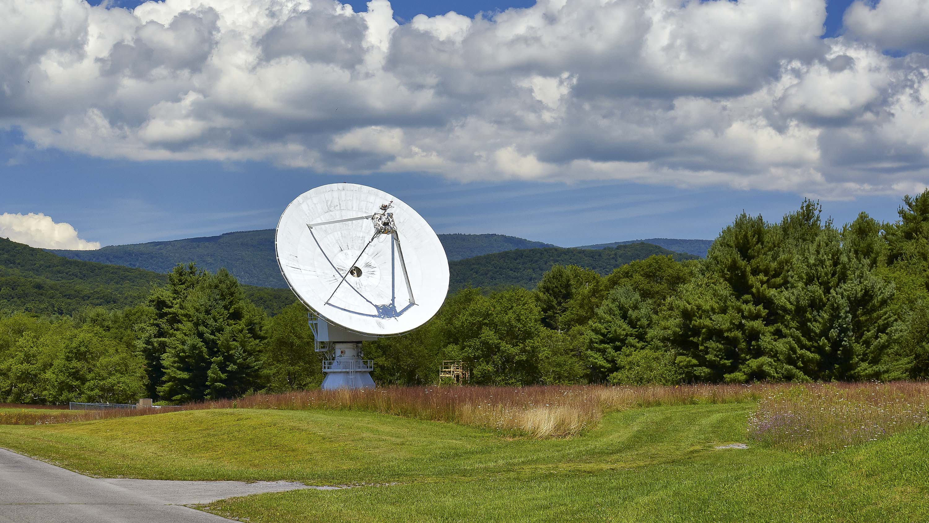 <p><strong>Estimated cost:</strong> $1,016</p> <p>Green Bank lies in the 13,000-square-mile National Radio Quiet Zone where TV, Wi-Fi, cellphones and even microwaves are verboten. The silence avoids interference with the Robert C. Byrd Green Bank Telescope, which listens for energies in outer space as minute as a lone snowflake hitting the ground.</p> <p>You can't upload selfies, but you can call your friends from a genuine payphone, something that's hard to find in the rest of the U.S. Enjoy a respite from electromagnetic fields in Green Bank, and take a telescope tour, visit the observatory's science center or hike miles of unspoiled nature.</p> <p><strong>How to get there:</strong> Fly to Charlottesville, Virgina, and rent a car, as trains and buses only run within an hour's drive of the town. Just make sure it doesn't have automatic tire pressure sensors, which interfere with the telescope.</p>