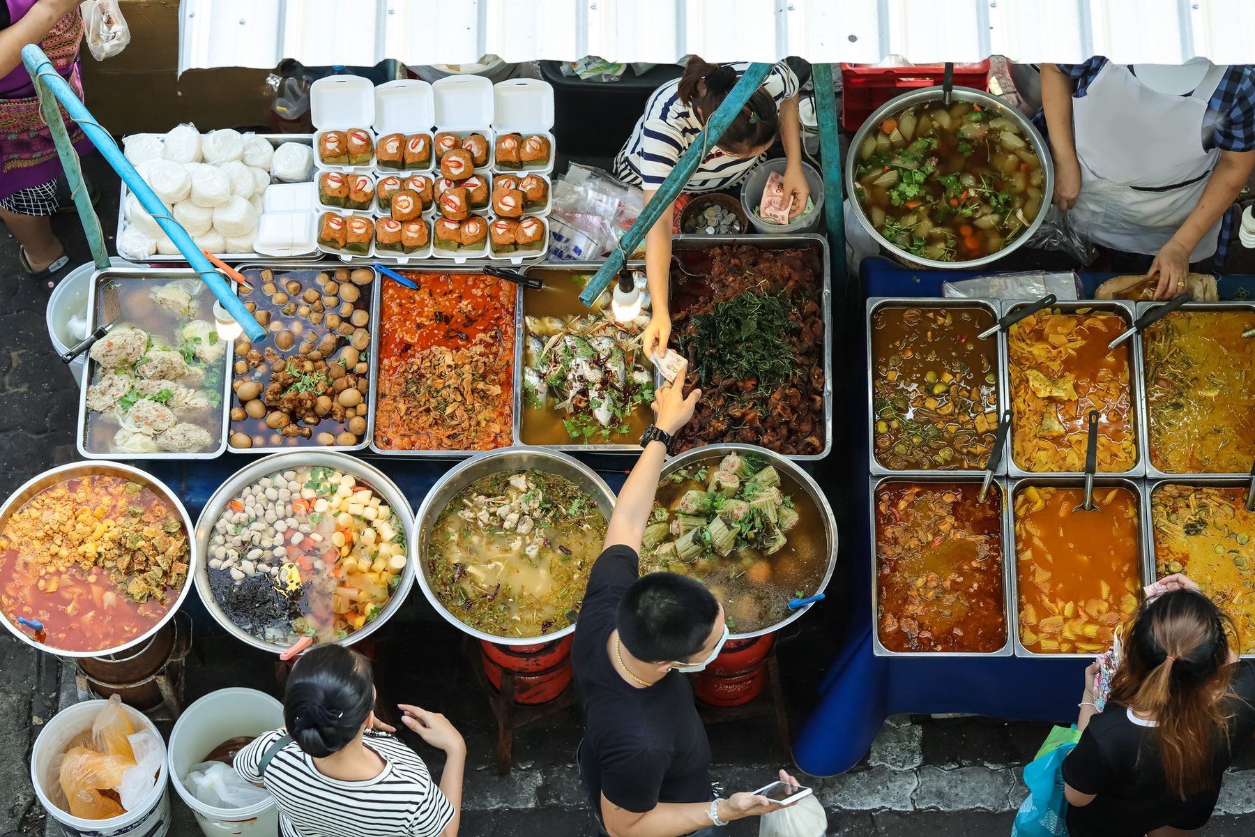 Monthly minimum: $248 Bangkok’s Chinatown District (known to locals as Yaowarat) is considered the birthplace of street food, with more than <a href="https://www.bangkokpost.com/thailand/general/1582794/street-vendor-rules-in-bangkok-hurting-tourism" rel="noreferrer noopener">110,000 food vendors</a> today. As such, the city has a rich history of providing delicious food at affordable prices, and that includes groceries.