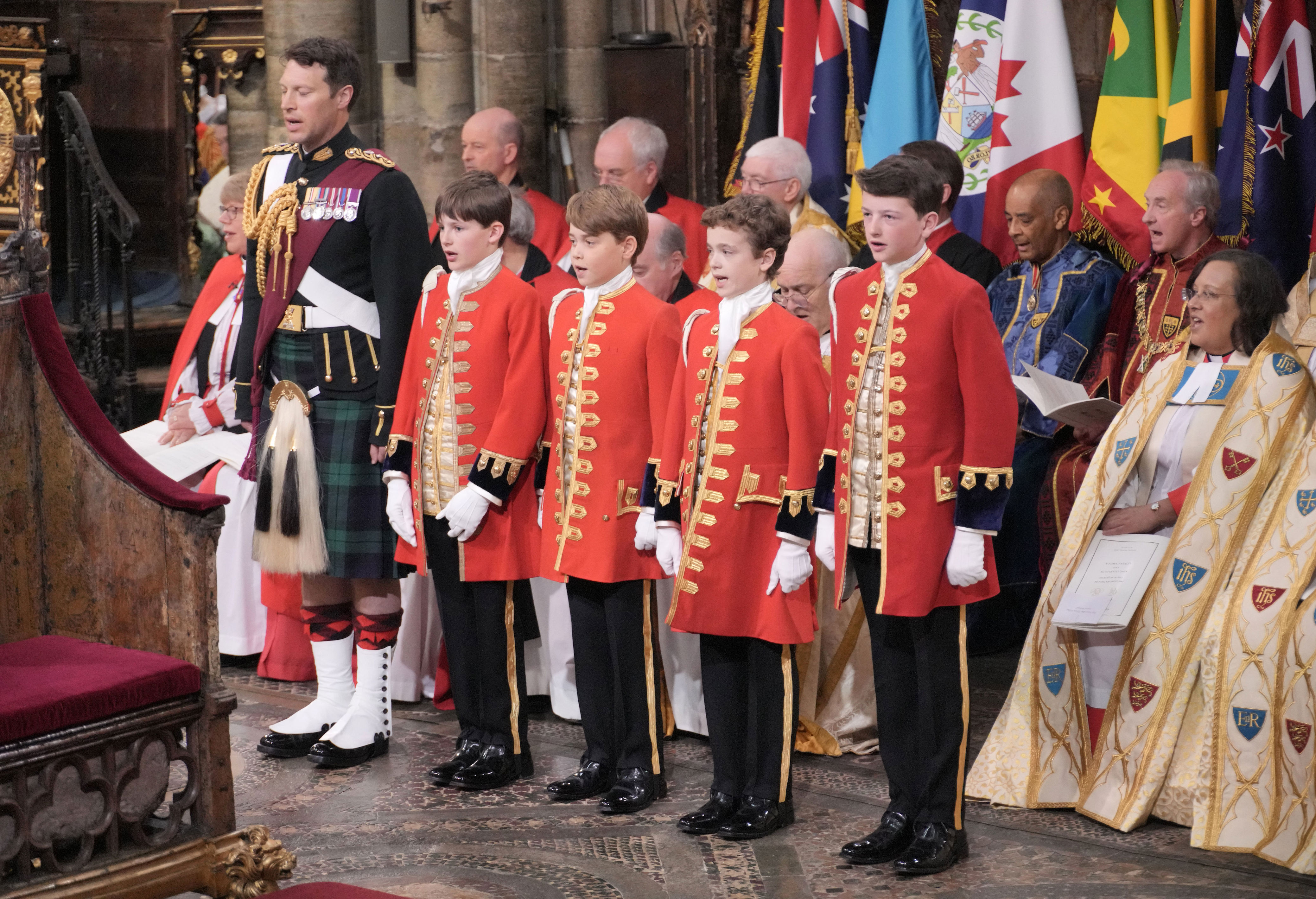 <p>Prince George -- the page of honor -- was flanked by fellow pages Lord Oliver Cholmondley, Nicholas Barclay and Ralph Tollemache at <a href="https://www.wonderwall.com/celebrity/the-coronation-of-king-charles-iii-and-queen-camilla-the-best-pictures-of-all-the-royals-at-this-historic-event-735015.gallery">the coronation ceremony</a> of King Charles III and Queen Camilla in Westminster Abbey in London on May 6, 2023.</p>