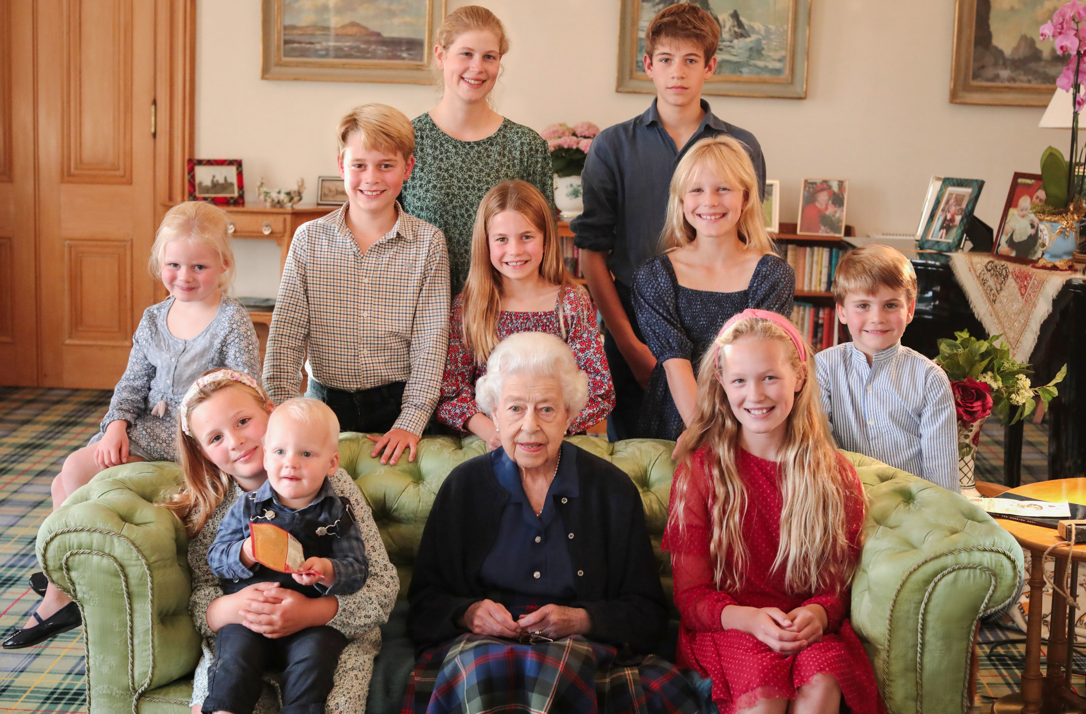 <p>Kensington Palace released this photo of some of Queen Elizabeth II's grandchildren and great-grandchildren -- including the Prince and Princess of Wales' three kids -- to mark what would have been the late monarch's 97th birthday in April 2023. The photograph was taken by Princess Kate at the monarch's Balmoral estate in Scotland in the summer of 2022. Back row, from left: Lady Louise Mountbatten-Windsor and James, Earl of Wessex. Middle row, from left: Lena Tindall, Prince George, Princess Charlotte, Isla Phillips, Prince Louis. Front row, from left: Mia Tindall holding Lucas Tindall, Queen Elizabeth II and Savannah Phillips.</p>