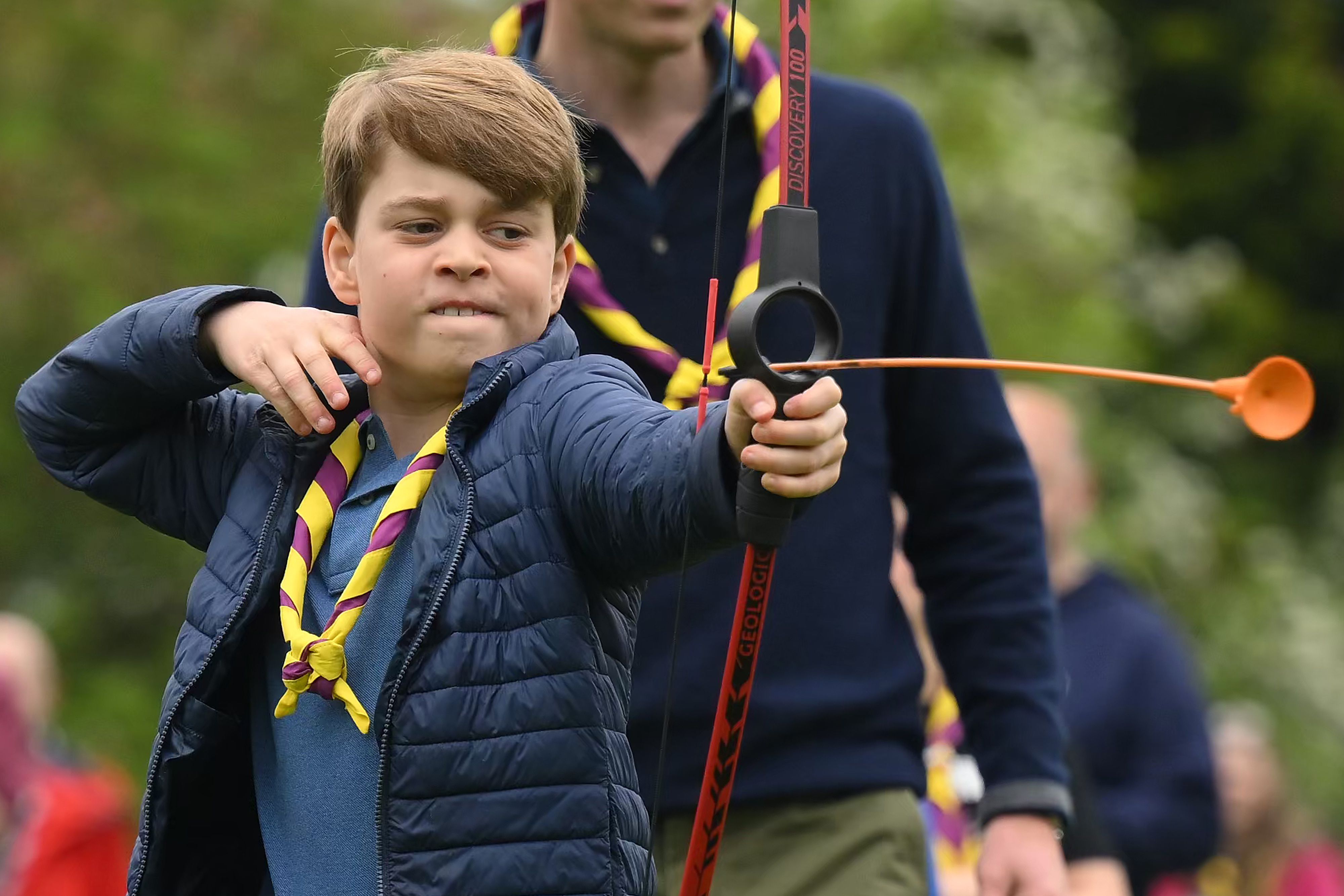 <p>Prince George tried his hand at archery while taking part in the Big Help Out volunteering drive -- the final event of grandfather King Charles III's <a href="https://www.wonderwall.com/celebrity/the-coronation-of-king-charles-iii-and-queen-camilla-the-best-pictures-of-all-the-royals-at-this-historic-event-735015.gallery">coronation</a> festivities -- during a visit to the 3rd Upton Scouts Hut in Slough, England, on May 8, 2023, where he and his siblings and parents helped to renovate and improve the building during their visit.</p>