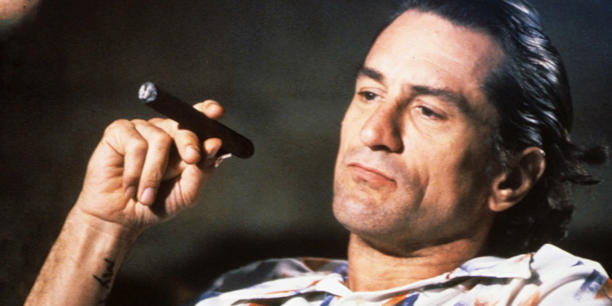 Robert De Niro as Max Cady with a cigar In Cape Fear