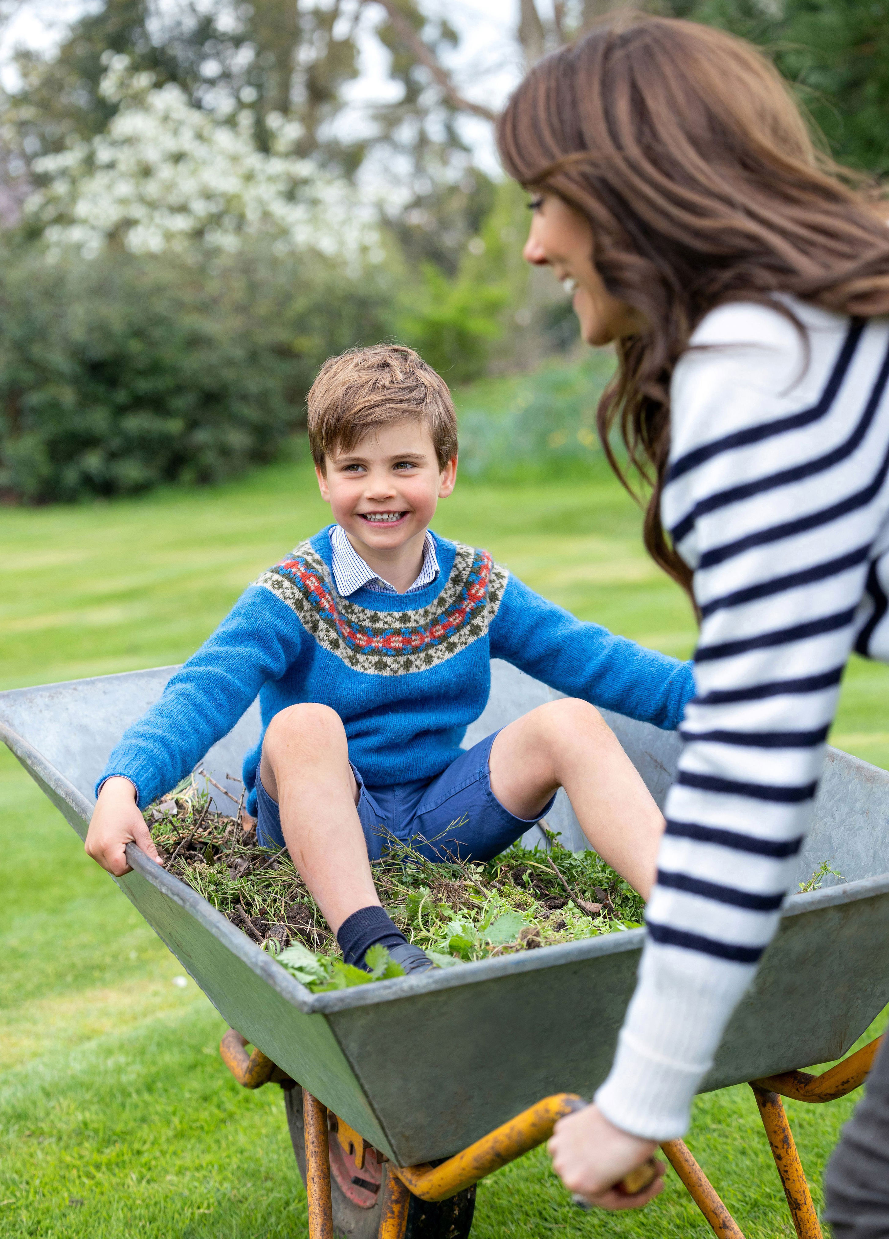 <p><span>Princess Kate pushed her youngest child, Prince Louis, in a wheelbarrow in Windsor, England, in this snapshot released by Kensington Palace to mark the young royal's 5th birthday on April 23, 2023.</span></p>