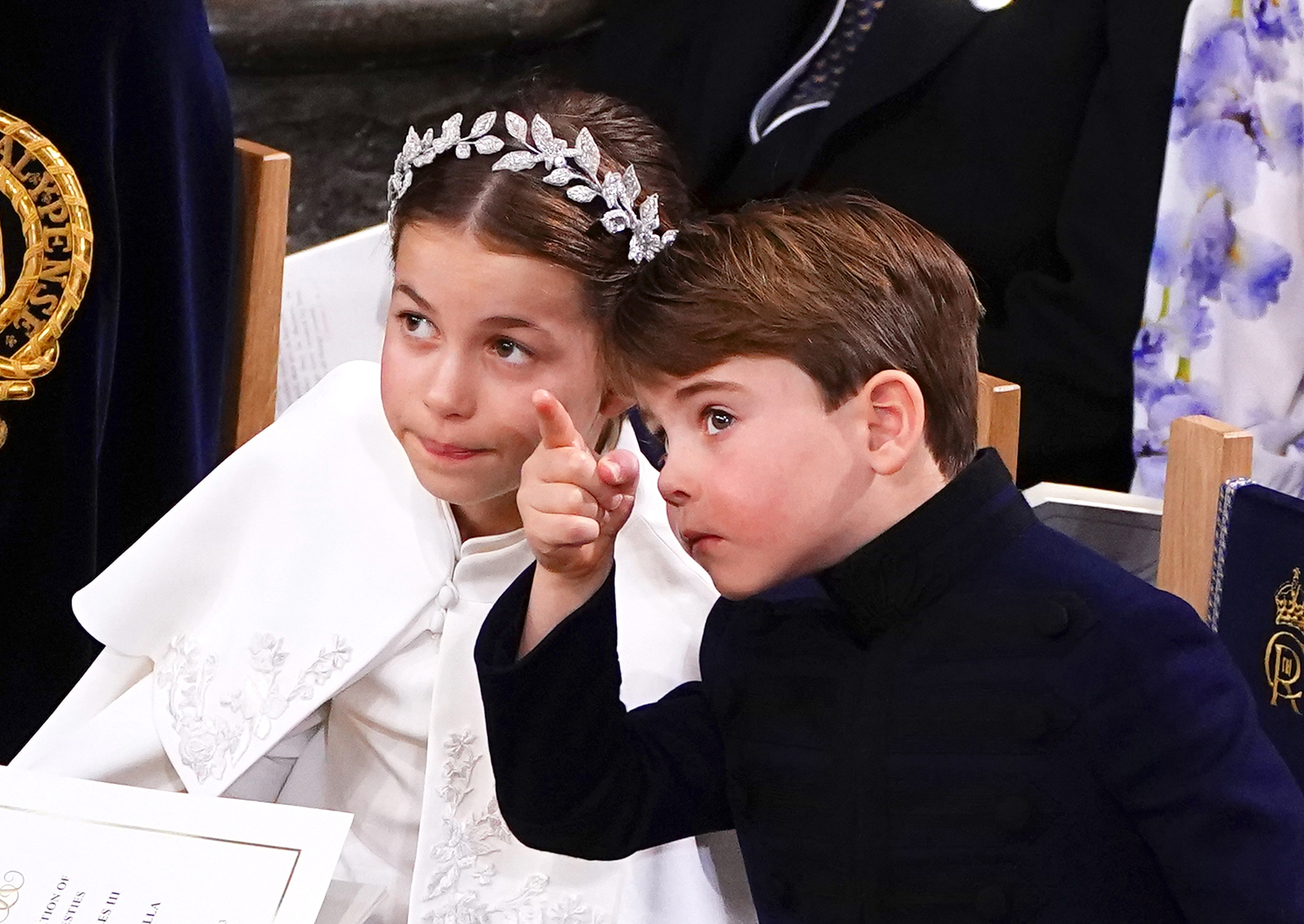 <p>Prince Louis pointed out something to sister Princess Charlotte during <a href="https://www.wonderwall.com/celebrity/the-coronation-of-king-charles-iii-and-queen-camilla-the-best-pictures-of-all-the-royals-at-this-historic-event-735015.gallery">the coronation ceremony</a> of King Charles III and Queen Camilla in Westminster Abbey in London on May 6, 2023.</p><p>MORE: <a href="https://www.wonderwall.com/celebrity/royals/duchess-camilla-parker-bowles-prince-charles-queen-consort-wife-best-photos-622676.gallery">See the best photos of the newly titled Queen Consort Camilla since her marriage to King Charles III</a></p>