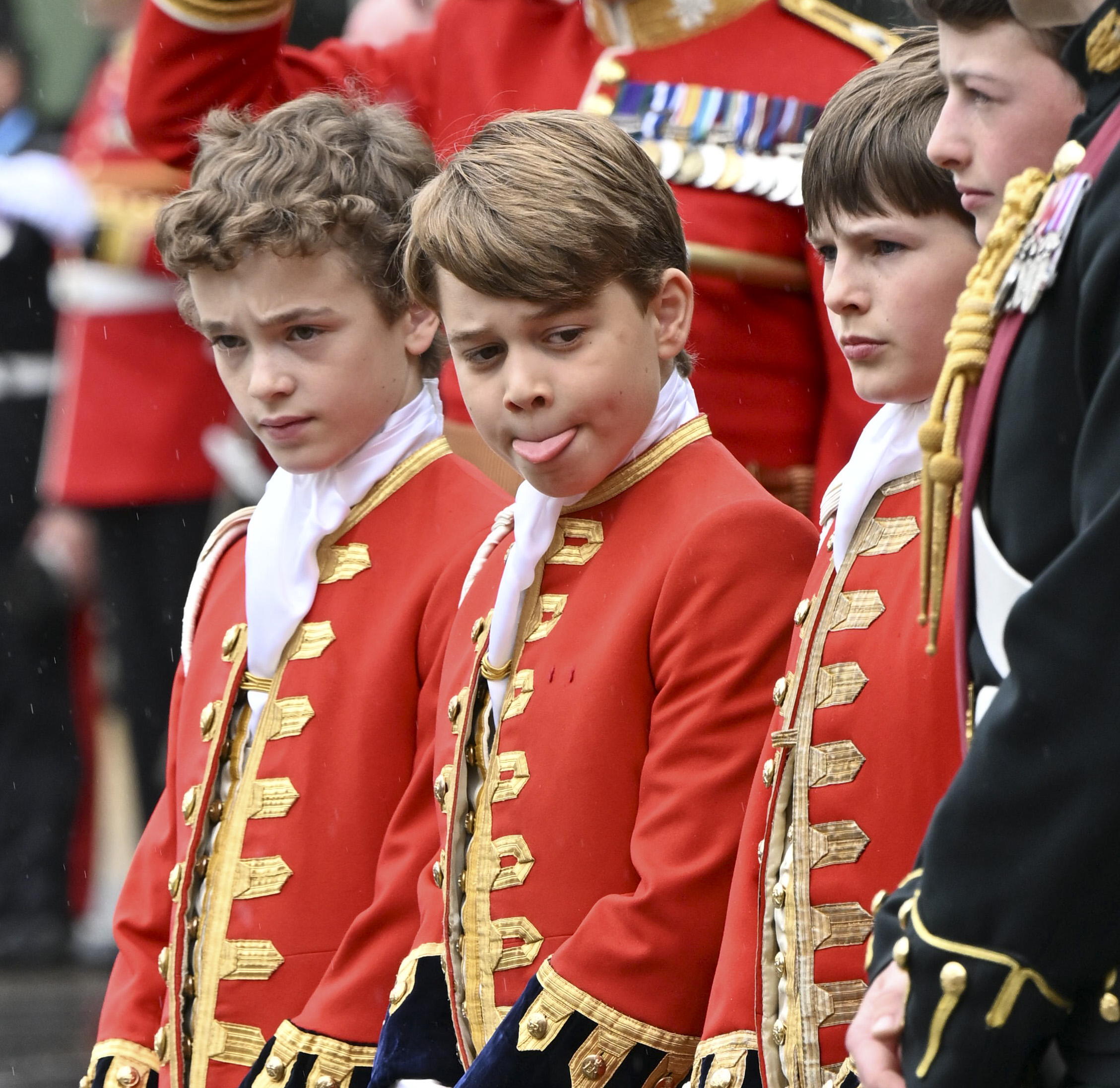 <p>Prince George, the page of honor, made a face alongside the other pages at <a href="https://www.wonderwall.com/celebrity/the-coronation-of-king-charles-iii-and-queen-camilla-the-best-pictures-of-all-the-royals-at-this-historic-event-735015.gallery">the coronation ceremony</a> of King Charles III and Queen Camilla in Westminster Abbey in London on May 6, 2023.</p>