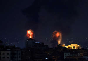 Explosions light up the sky after the Israeli military said in a statement that it has struck Islamic Jihad targets, in Gaza, May 9, 2023