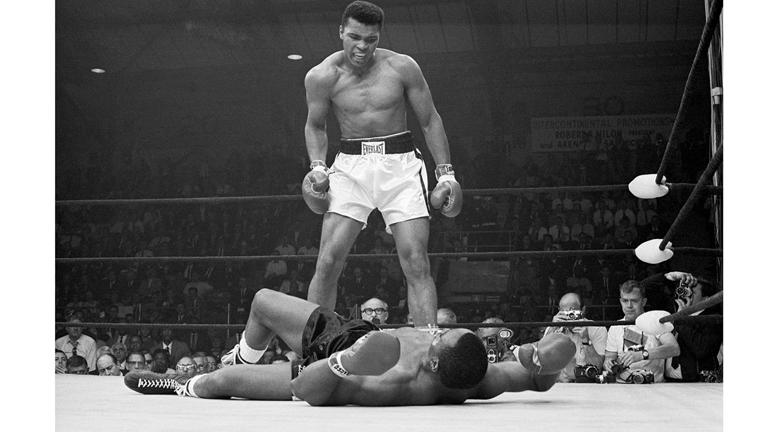 Heavyweight champion Muhammad Ali stands over Sonny Liston during their second bout in 1965 and taunts him to get up during their title fight. Ali knocked Liston out in one minute in the first round of their bout at the Central Maine Youth Center in Lewiston, Maine. Getty Images