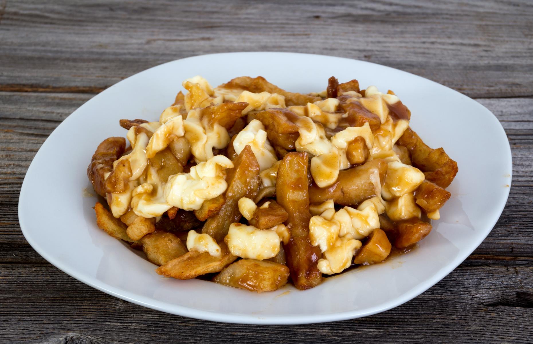 <p>Canadian staple poutine is a favourite of the Duchess of Sussex. Meghan discovered the comforting dish of fries topped with cheese curds and hot gravy while filming <em>Suits</em> in Toronto, according to <em>Delish</em>. "It's got to squeak when you bite into it... that's how you know you've got the right kind," she told the publication. </p>