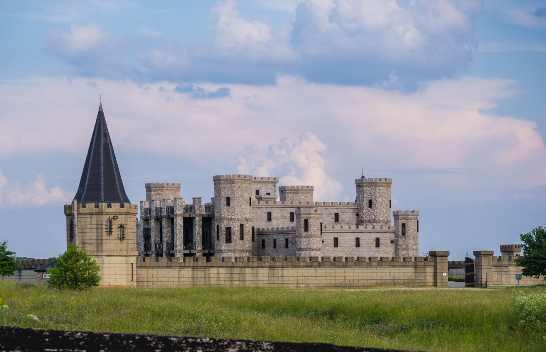 <p class="p1"><span>A castle in Versailles? Must be France, right? Nope, Kentucky. The Martin Castle, or Castle Post, was <a href="http://www.dupontcastle.com/castles/martin.htm" rel="noreferrer noopener"><span>built in 1969 by a real estate developer</span></a> after returning from a trip to Europe where he was inspired by the German castles. It was then purchased in 2004 by a lawyer from Miami, who spent a considerable amount of money rebuilding the house after it caught fire.</span></p>