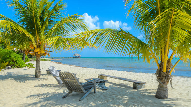 Paradise beach in Placencia, tropical coast of Belize, Caribbean Sea, Central America.
