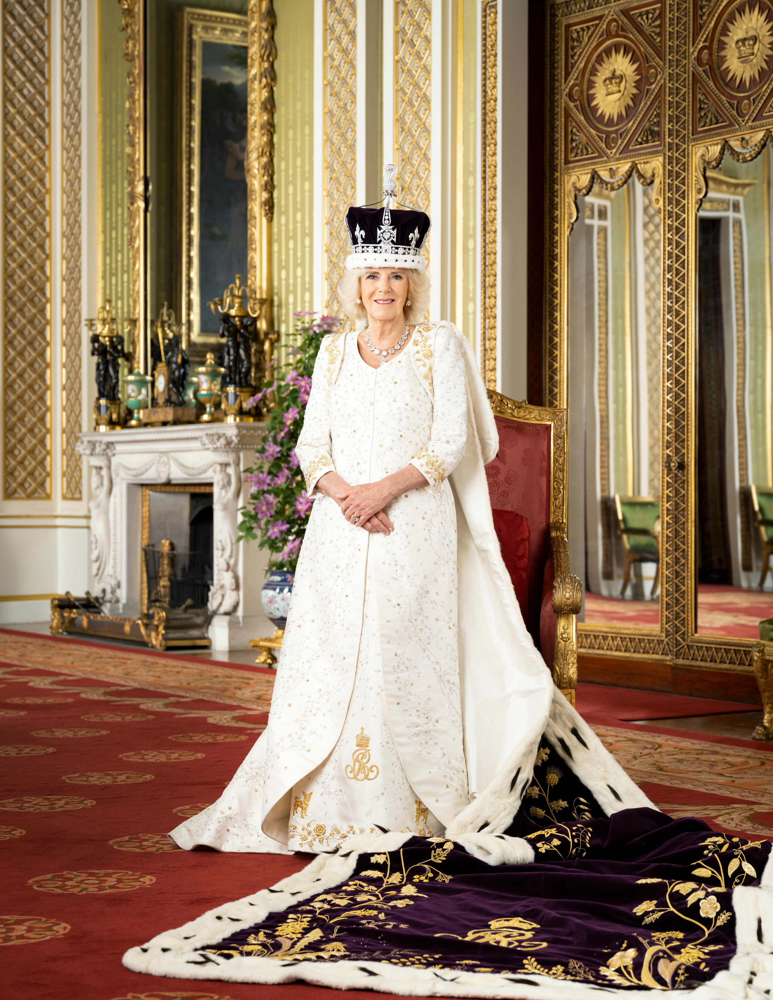 <p>Queen Camilla is pictured in the Green Drawing Room of Buckingham Palace in London wearing Queen Mary's Crown and Robe of Estate in this official <a href="https://www.wonderwall.com/celebrity/the-coronation-of-king-charles-iii-and-queen-camilla-the-best-pictures-of-all-the-royals-at-this-historic-event-735015.gallery">coronation</a> portrait released on May 8, 2023. </p>
