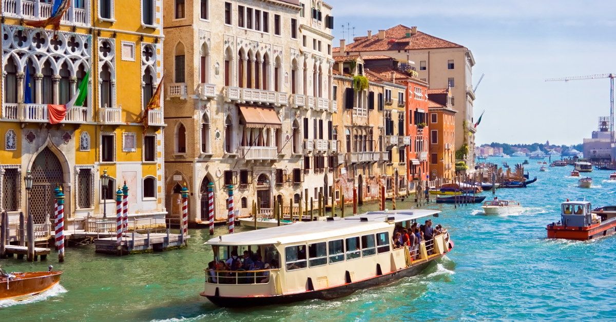 <p> Cost-conscious travelers can skip the gondolas and check out Venice by ferry instead. These “bus boats” are a form of public transportation that take riders around the city, stopping at many famed neighborhoods and landmarks along the way.  </p> <p> Hopping aboard a vaporetto is the cheapest way to get around Venice. And while it may not be as romantic as a gondola, you'll still be able to take in the famed city’s beauty as you cruise along the waterways. </p>