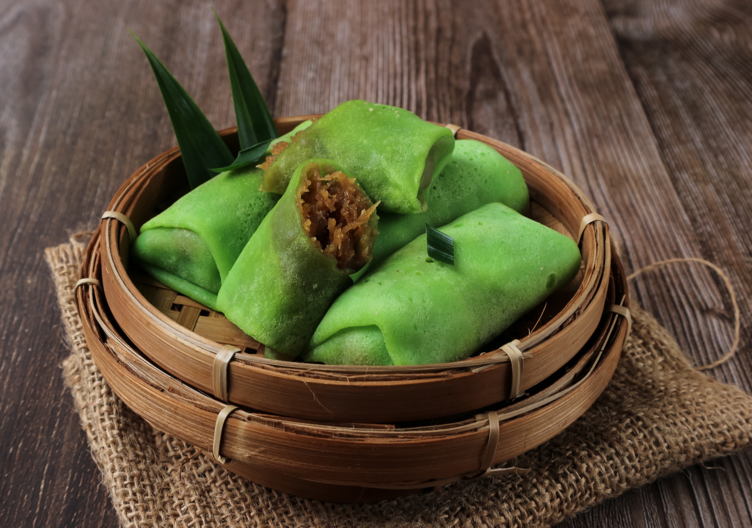 <p><em>Dadar gulung</em> (which translates to “rolled pancake”) is a popular Indonesian snack that resembles a blintz — except it’s bright green! Pandan paste provides the hue, and the filling consists of palm sugar and coconut. If you can make pancakes, you can handle <a href="https://soyummyrecipes.co.uk/dadar-gulung-pancake-coconut-filling/"><span>this version from So Yummy Recipes</span></a>.</p><p>You may also like: <a href='https://www.yardbarker.com/lifestyle/articles/our_favorite_refreshing_foods_when_the_weather_is_warm/s1__37693494'>Our favorite refreshing foods when the weather is warm</a></p>