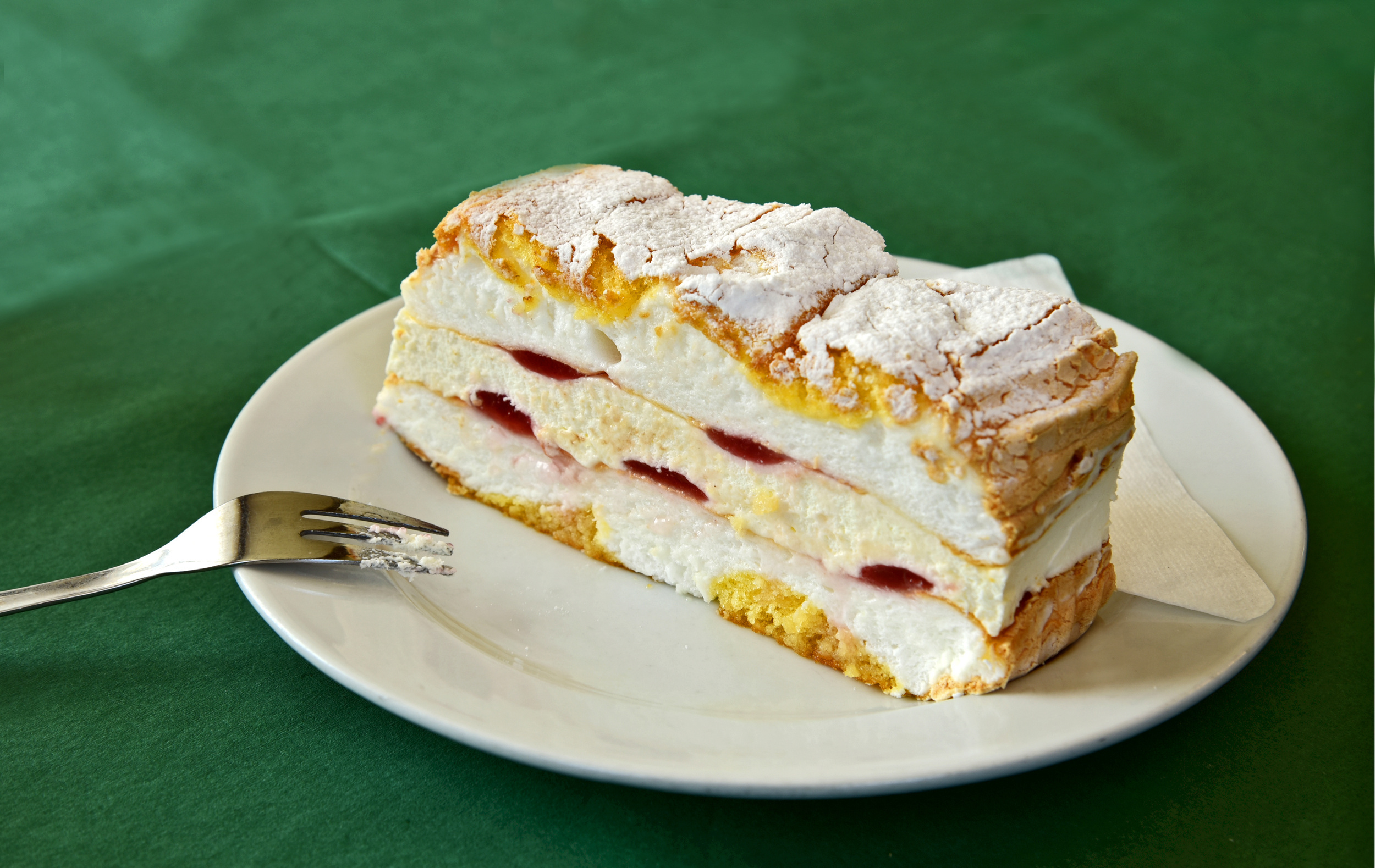 <p><em>Kardinalschnitten</em>, or "cardinal slices," is a traditional Viennese dessert that consists of meringue layered between slices of sponge cake, with yellow and gold colors reminiscent of the Catholic church. Plus, berries provide a pop of red! <a href="https://culinarytalks.com/austrian-cardinal-slice/"><span>Culinary Talks can talk you through the process</span></a>.</p><p>You may also like: <a href='https://www.yardbarker.com/lifestyle/articles/21_food_drink_items_that_have_been_around_for_thousands_of_years/s1__38178665'>21 food & drink items that have been around for thousands of years</a></p>