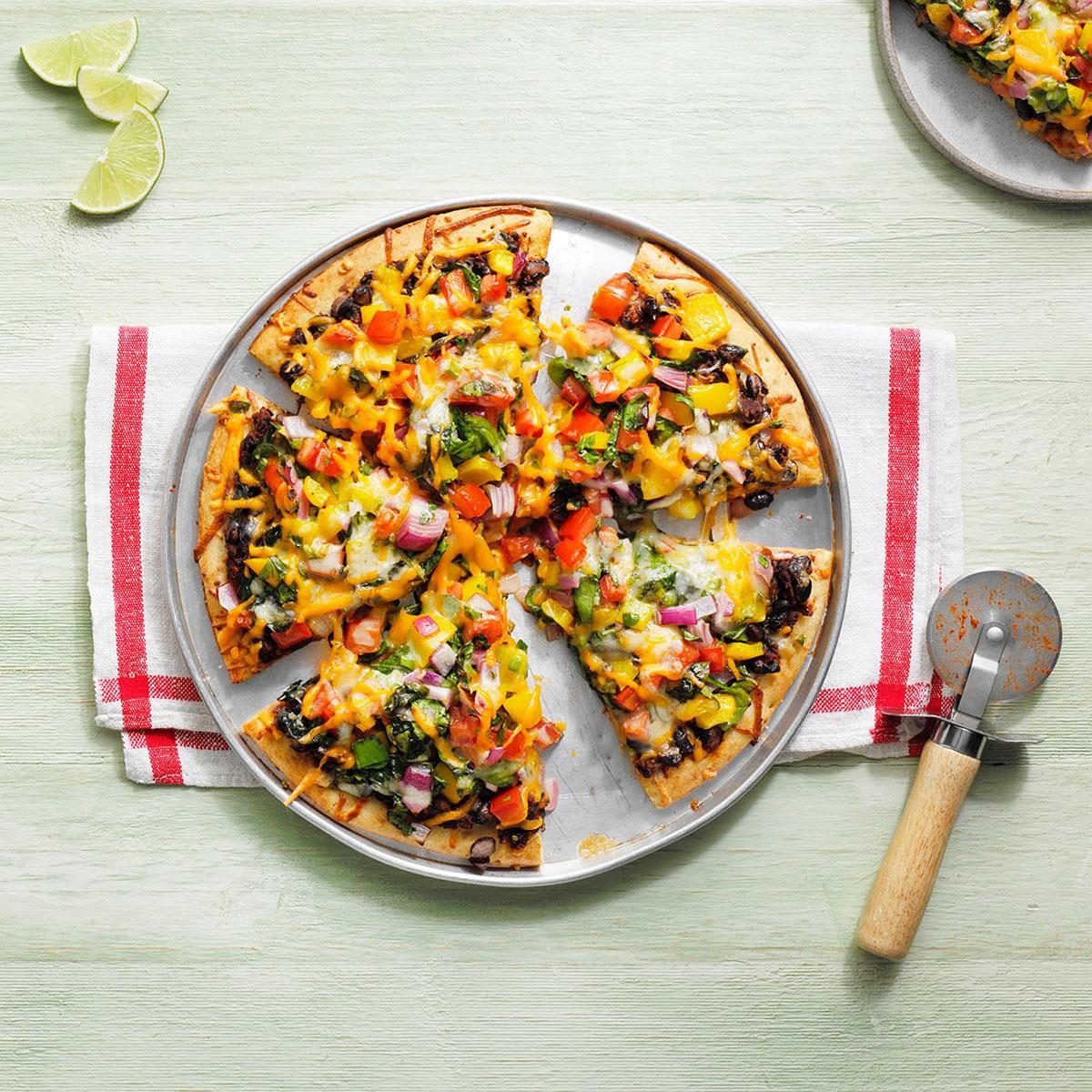 <p>Switch up the pizza toppings for Dad's Day dinner. This recipe uses Mexican toppings like jalapeños and cilantro.</p> <div class="listicle-page__buttons"> <div class="listicle-page__cta-button"><a href='https://www.tasteofhome.com/recipes/loaded-mexican-pizza/'>Go to Recipe</a></div> </div>