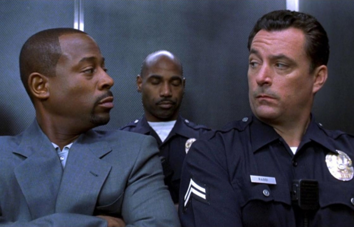 <p>In Blue Streak, a thief named Miles Logan (played by Martin Lawrence) pretends to be a cop to retrieve a diamond he tried to steal years ago. The only problem is that the diamond is buried under a police precinct. Miles has to blend in with the officials, faking his way into their hearts using wild methods.</p>