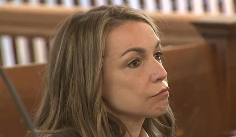 Woman who denies charge in Boston police officer’s death fighting for more evidence