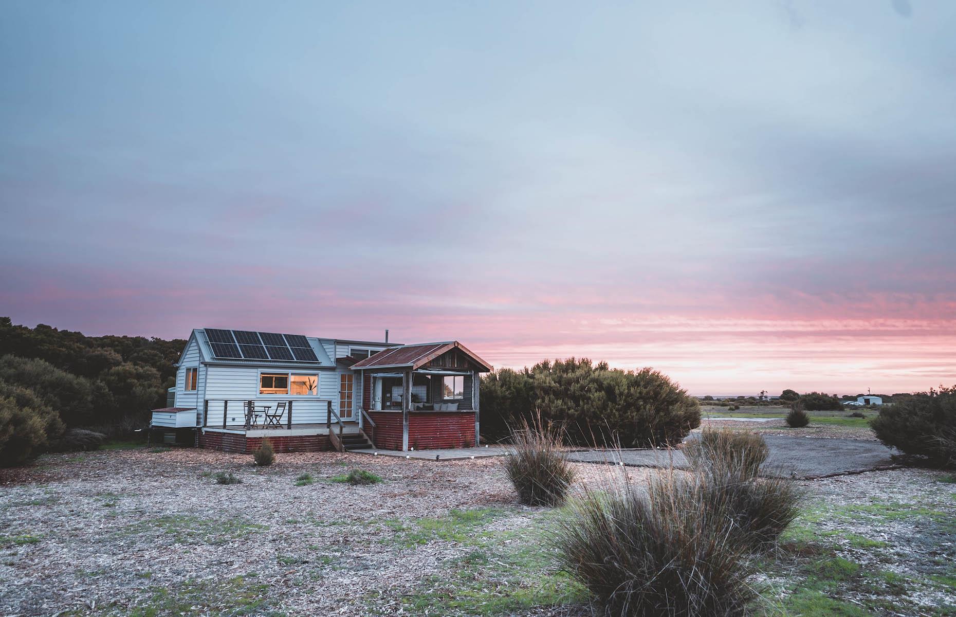 <p>A stone’s throw from Marion Bay on South Australia’s Yorke Peninsula, this family-run glamping enterprise is a real gem. Guests can stay in a beachside bell tent or go for the off-grid <a href="https://baysideglamping.com.au/tiny-house/">Tiny House</a> (pictured) just out of town. The cozy cabin, which uses solar power and rainwater, has a large fairy-light festooned deck with lounge and barbecue, along with a hot shower, comfy bed and large windows for enjoying the uninterrupted views of the surrounding grassland, where emus and roos are the only likely onlookers.</p>